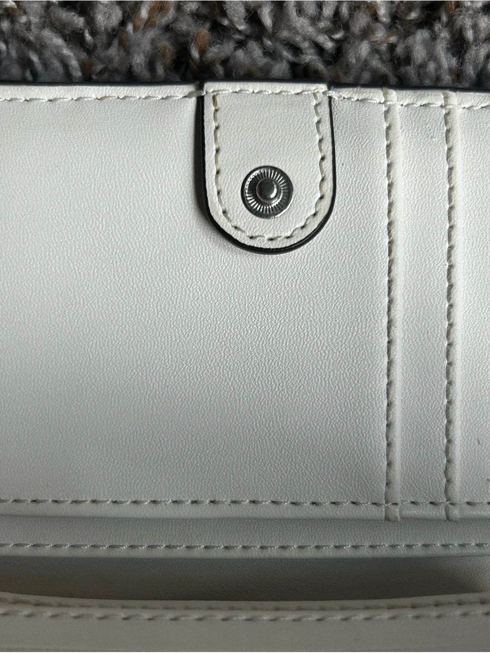 Michael Kors Pebbled Leather Fold-Over Wallet in Off-White with Silver Logo